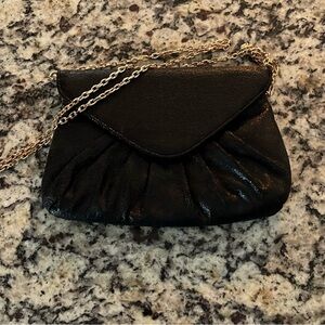 Free with a purchase. Women bag 💼, color black, good condition.